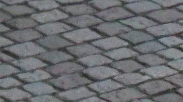 Foto aérea de varios autos en un estacionamiento al aire libre