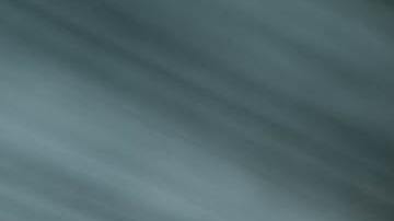 Foto del interior de la cabina de un modelo de Tesla con dos ocupantes