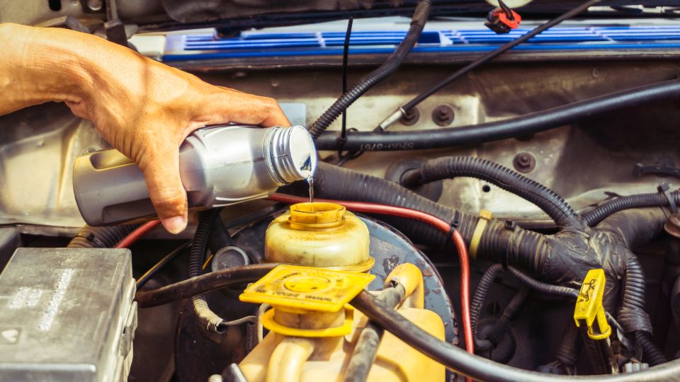 What damage can brake fluid cause to car paint?