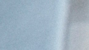 Foto de un instructor del DMV junto a una nueva conductora