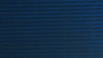 DE izq. a dcha: Max Verstappen, Sergio "Checo" Pérez, Jim Farley, Christian Horner y Daniel Ricciardo.