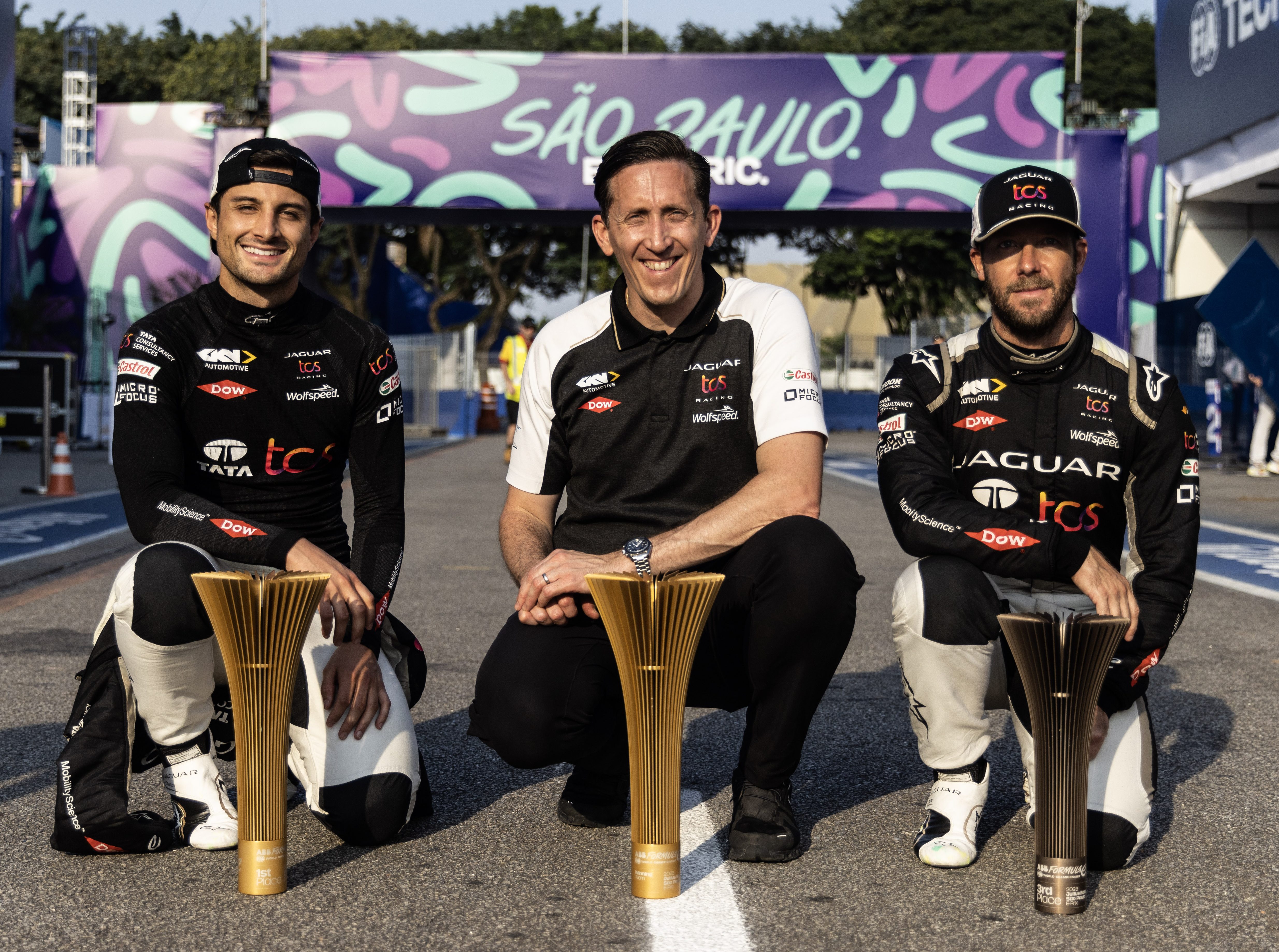 Sao Paulo, Brazil - MARCH 25: In this handout from Jaguar Racing, Mitch Evans, Jaguar TCS Racing, 1st position, James Barclay, Team Director, Jaguar TCS Racing, and Sam Bird, Jaguar TCS Racing, 3rd position, with the trophies during the ABB FIA Formula E Championship - 2023 Julius Baer São Paulo E-Prix on March 25, 2022 in Sao Paulo, Brazil. (Photo by Handout/Jaguar Racing via Getty Images)