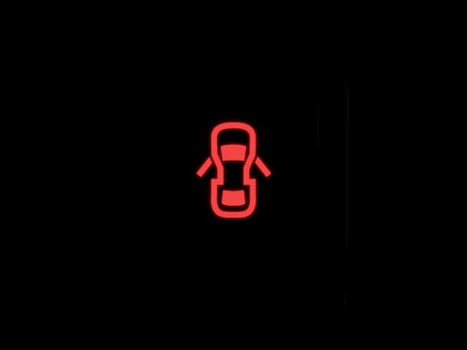 luz de puertas abiertas en el tablero del carro