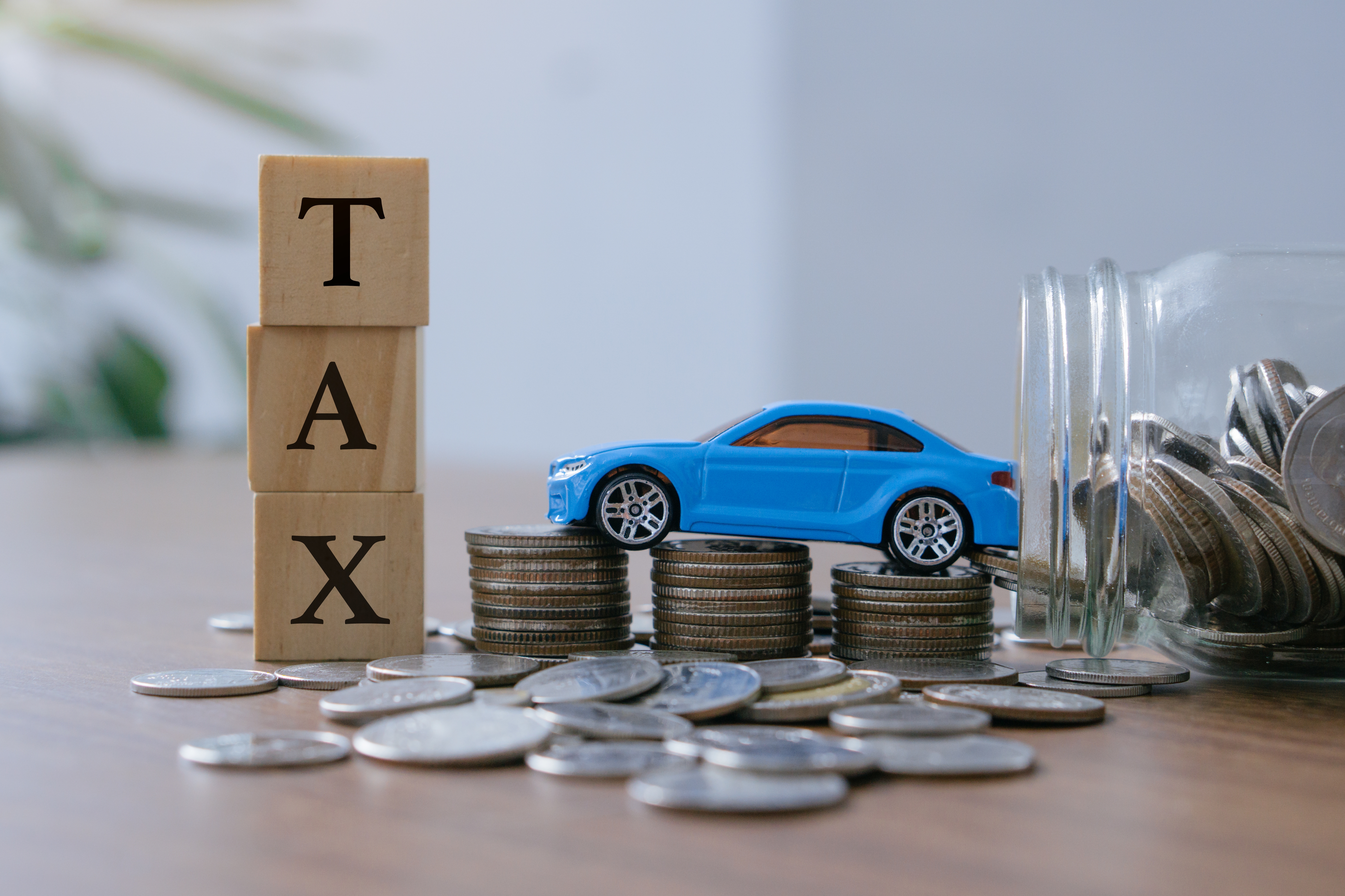 como pagar los taxes de carro en massachusetts