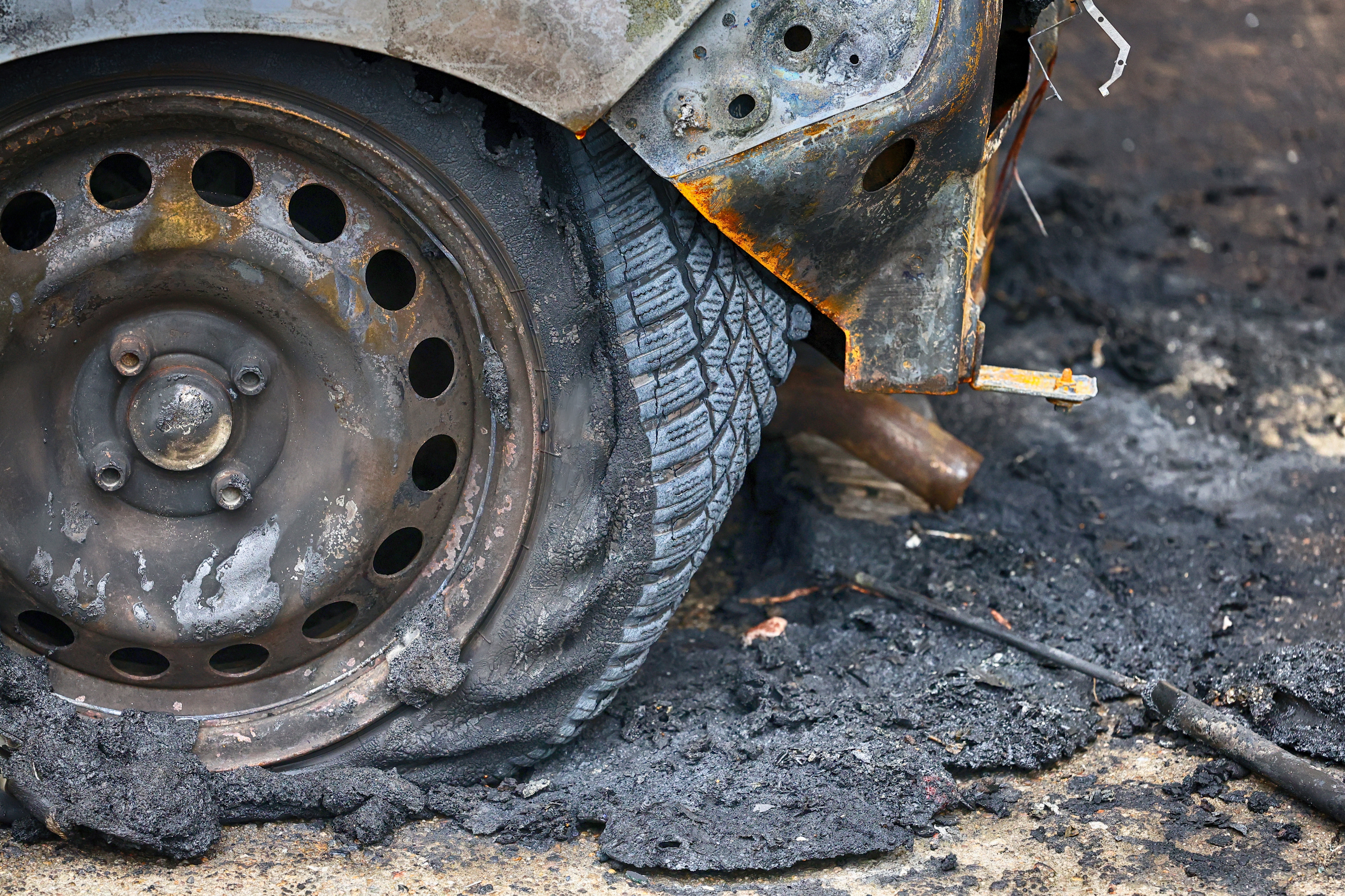 Burnt,Car,Wheel,,Tire.,Car,Fire.,Arson.