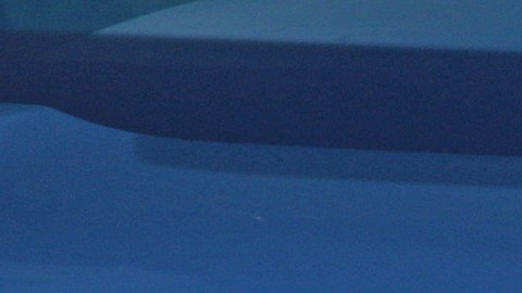 rebasar un vehículo estacionado