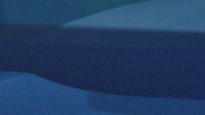 rebasar un vehículo estacionado