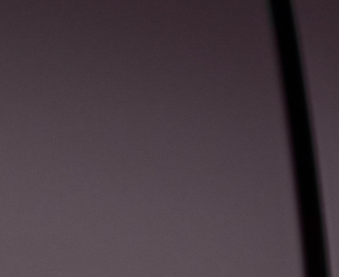 Nissan Z Heritage Edition 2026 usa rines Rays en color bronce.