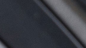 Interior de la Toyota Tacoma 2026 TRD Sport, palanca de cambios manual, detalles 4x4 y modos de manejo para camioneta pickup.