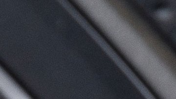 Interior de la Toyota Tacoma 2026 TRD Sport, palanca de cambios manual, detalles 4x4 y modos de manejo para camioneta pickup.