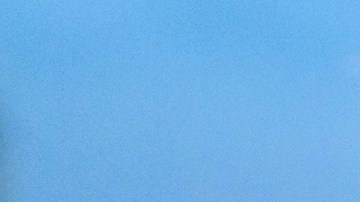 Consola de coche, esperando en un atasco de tráfico en el crepúsculo