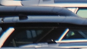 International trade concept: Numerous brand new cars are waiting to be transported