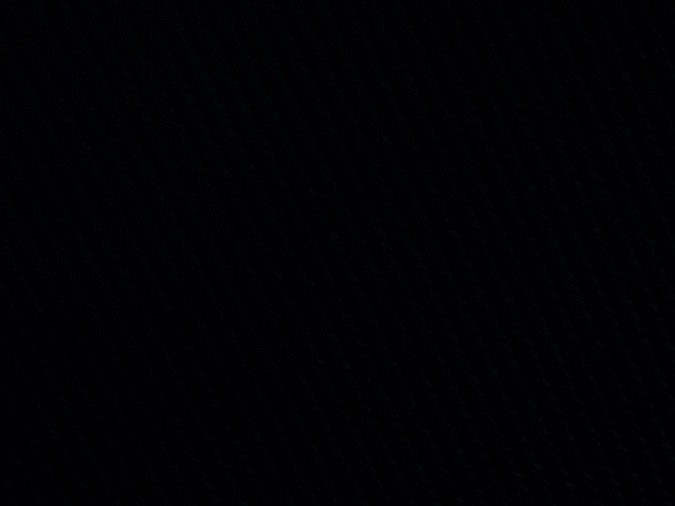 Rolls-Royce Black Badge Ghost Gamer tiene insiginias de jugador 1,2,3 y 4 para cada asiento.