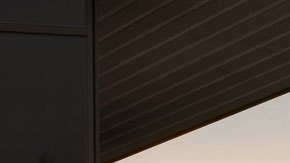 Kia Seltos 2027 negro de frente, apariencia robusta, parrilla grande y faros LED verticales, SUV compacto ideal para ciudad y aventura.