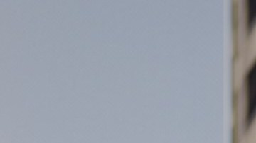 Vista frontal Honda Civic Si 2025 rojo, deportivo con parrilla agresiva y rines.