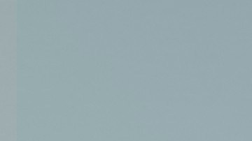 Honda Prologue Elite 2024 turquesa en carretera montañosa al atardecer, SUV eléctrico premium con equipaje, perfecto para exploración sostenible.