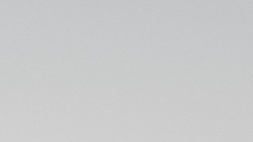 Hyundai Palisade 2025 negro en movimiento por desierto, SUV familiar tres filas potente con rines grandes y diseño robusto.