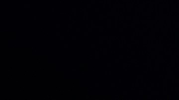 Acura RDX 2026 teaser lateral, silueta moderna con luces LED en fondo negro.