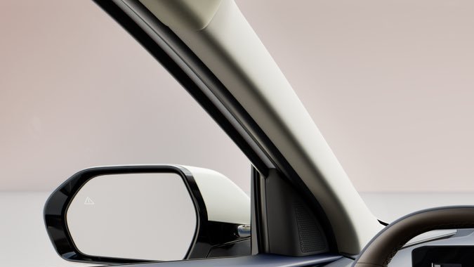 Interior Kia Niro 2027 con pantallas duales 12.3" y volante ergonómico en tonos beige