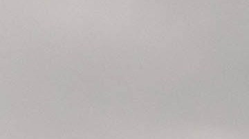 Subaru Crosstrek Hybrid 2026 perfil lateral en paisaje montañoso, líder en retención de valor crossovers compactos usados.