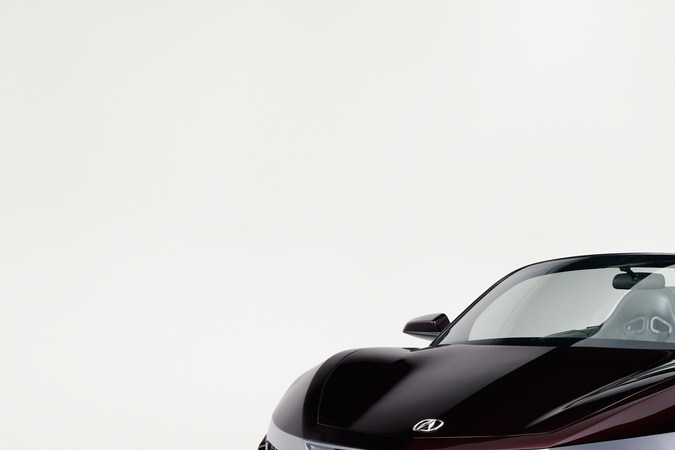 Acura NSX Roadster frontal 3/4, coche Iron Man Tony Stark subasta, prototipo descapotable exclusivo.