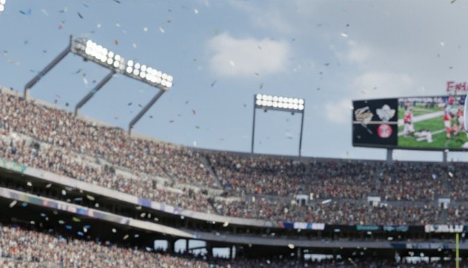 Balón del partido de fútbol americano de la NFL con el trofeo de la Super Bowl en el estadio