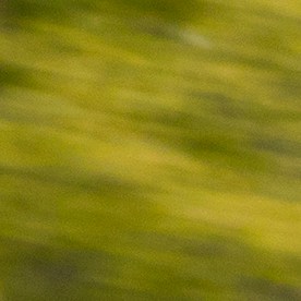 Acura NSX 1991 rojo en movimiento frontal, faros agresivos y spoiler en carretera abierta, icono de superdeportivos 90s.