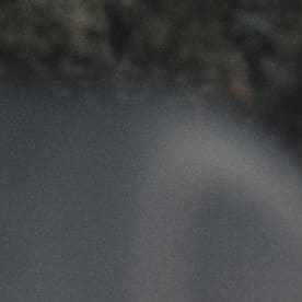 Interior espacioso Mazda CX-90 2026 con 8 asientos en tres filas, diseño lujoso y moderno para familias grandes.