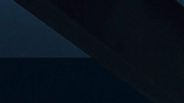 Toyotya BZ 2026 color azul en parking con puerto de carga