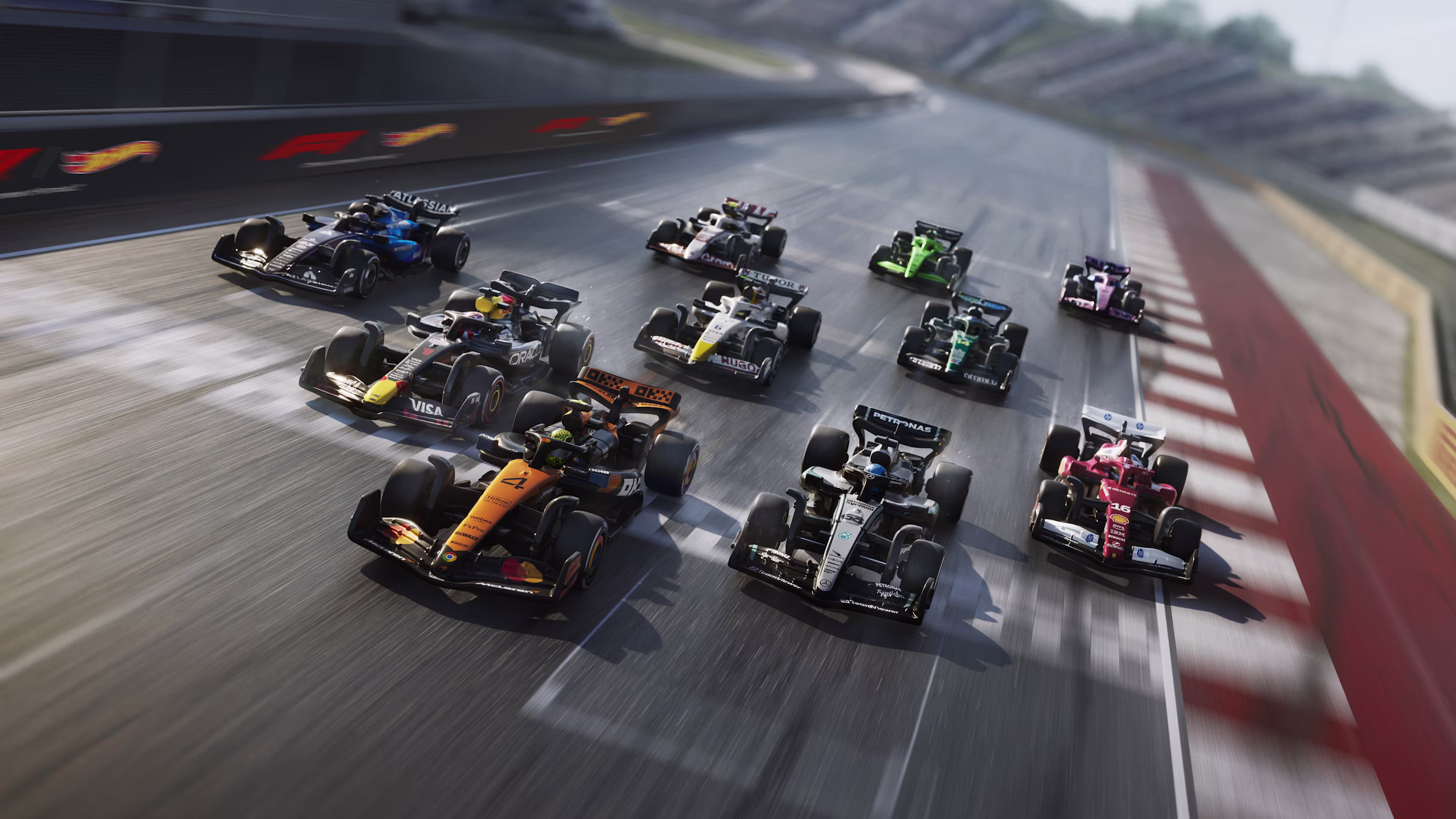 Carreras de Fórmula 1 con autos Hot Wheels miniatura en pista de alta velocidad 2026