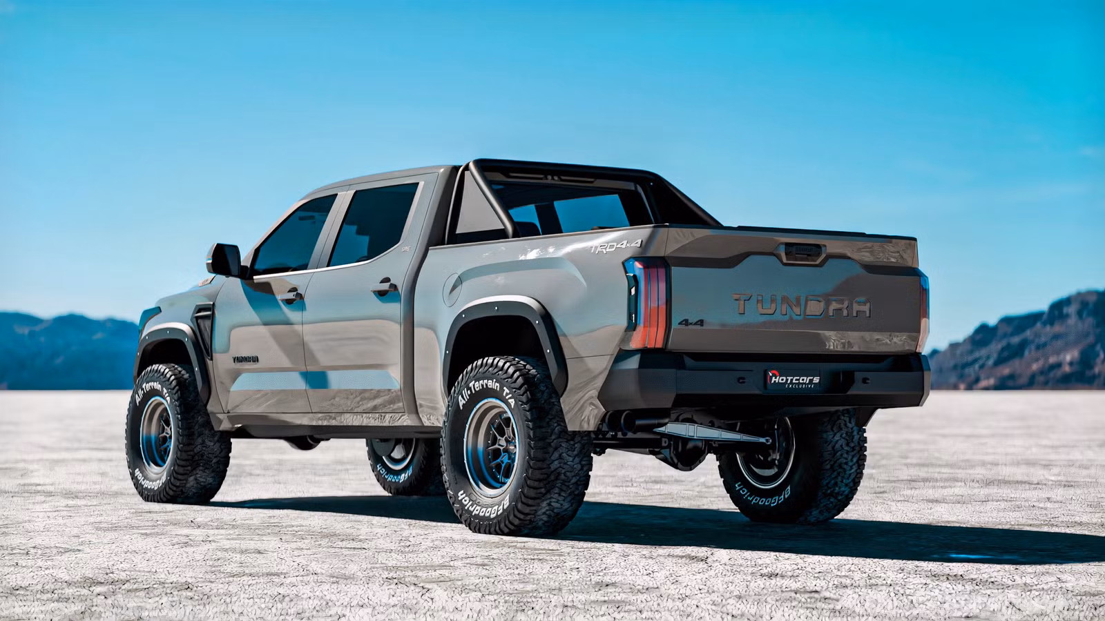 Vista trasera lateral de la Toyota Tundra TRD Hammer 2027 con llantas todo terreno en desierto