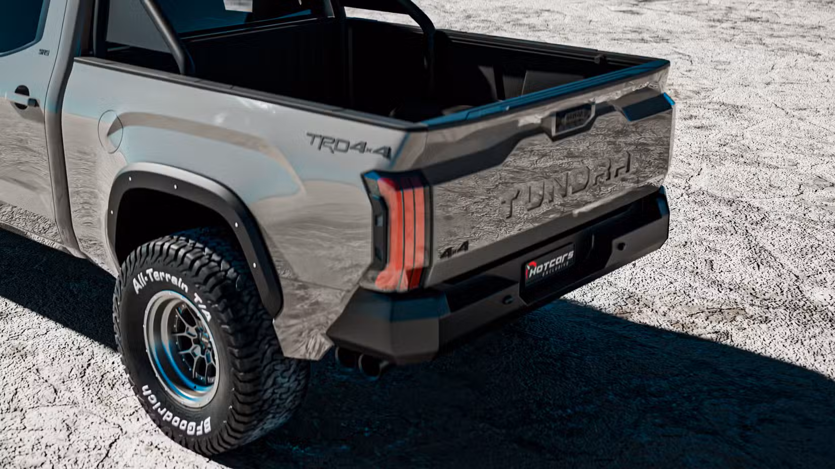 Vista trasera de la caja del Toyota Tundra TRD Hammer 2027 con llantas todo terreno