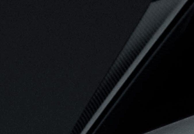 Detalle trasero Bentley Torcal. Logo Bentley y placa TORCAL en elegante SUV de lujo.