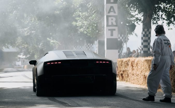 Racing legend Tom Kristensen races Audi Nuvolari up the 1.86-kilometer Hillclimb in the grounds of Goodwood House. The Nuvolari is the fastest and most powerful production vehicle in the brand’s history — and the first to follow Audi’s new design philosophy.