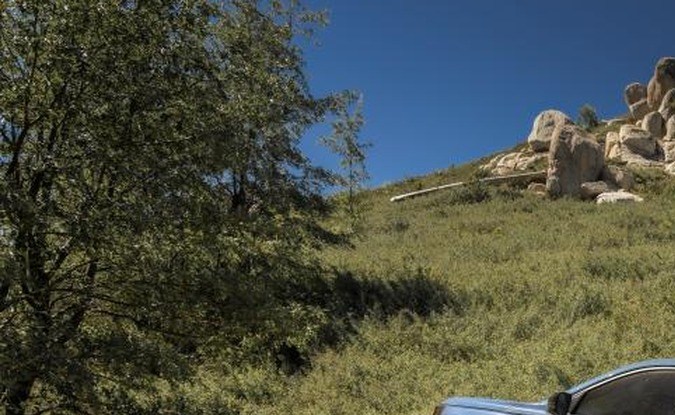 Perfil del Honda Passport TrailSport en sendero polvoriento